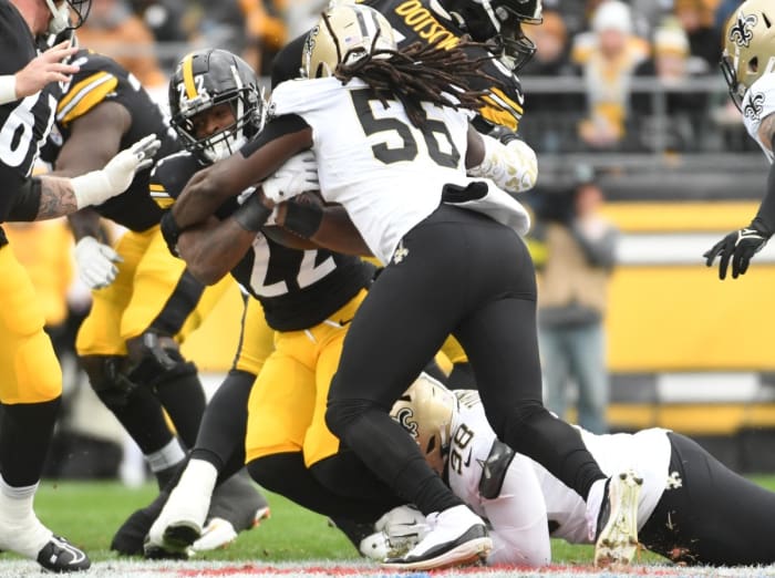 Pittsburgh Steelers running back Najee Harris (22) is stuffed by New Orleans Saints linebacker Demario Davis (56). Mandatory Credit: Philip G. Pavely-USA TODAY